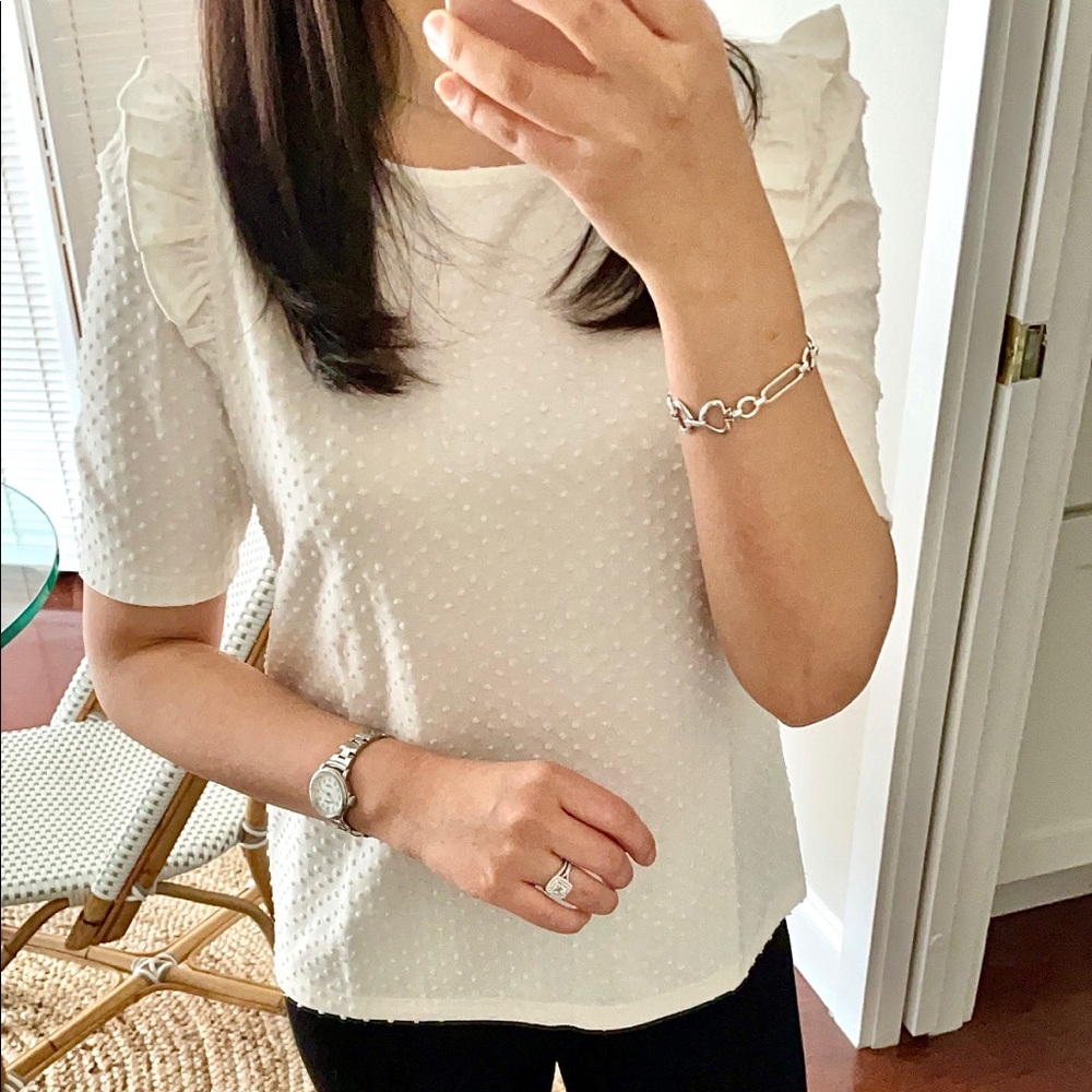 Dotted ruffle shoulder top